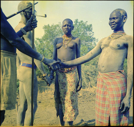 Mandari couples shaking hands