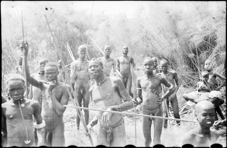 Nuer men at hippo hunt