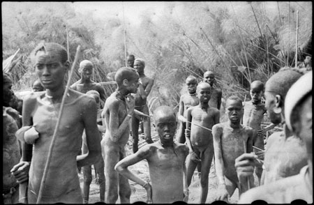 Nuer men at hippo hunt