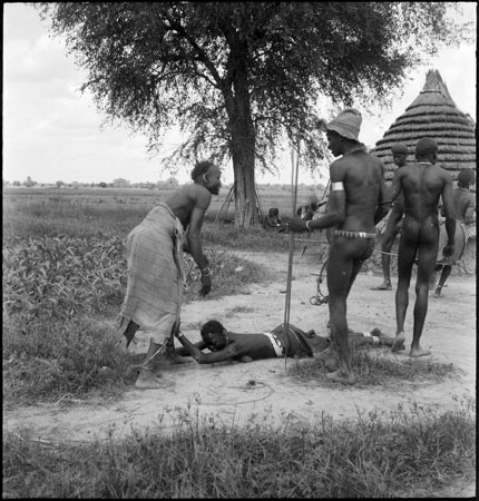 Dinka woman showing respect