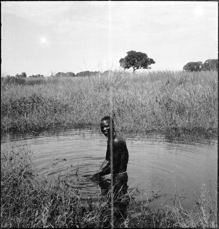 Dinka man bathing