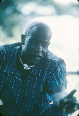 Dinka man wearing bead necklaces