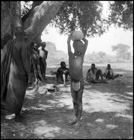 Dinka girl with melon