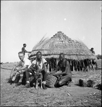 Lienhardt with Dinka hut thatchers