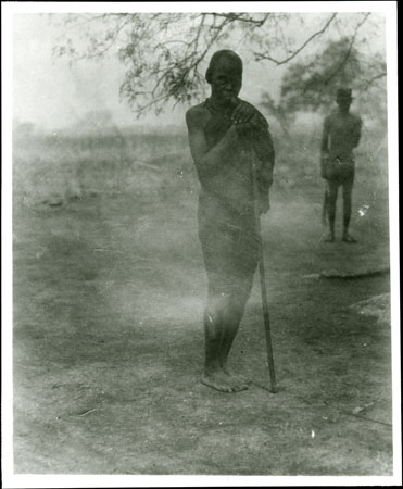 Old Zande man with staff