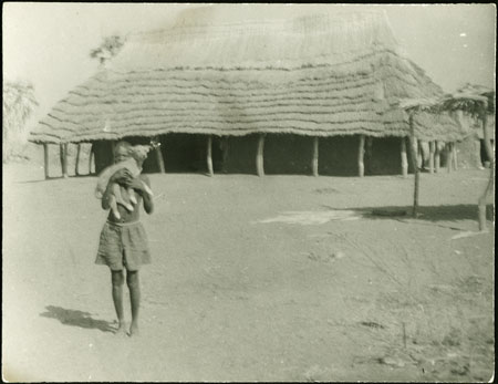 Mandari boy with dog at ?Tali post