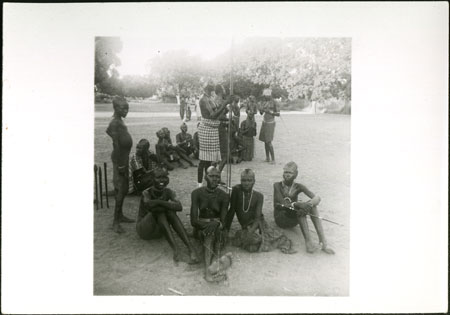 Mandari women sitting in homestead